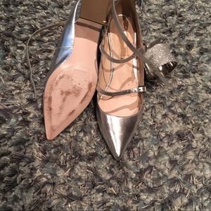 Silver shoes. Last few hours on display